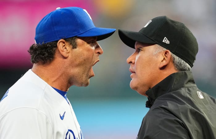 Apr 29, 2022; Kansas City, Missouri, USA; Kansas City Royals manager Mike Matheny (22) argues with umpire Manny Gonzalez (79) during the second inning against the New York Yankees at Kauffman Stadium. Mandatory Credit: Jay Biggerstaff-USA TODAY Sports